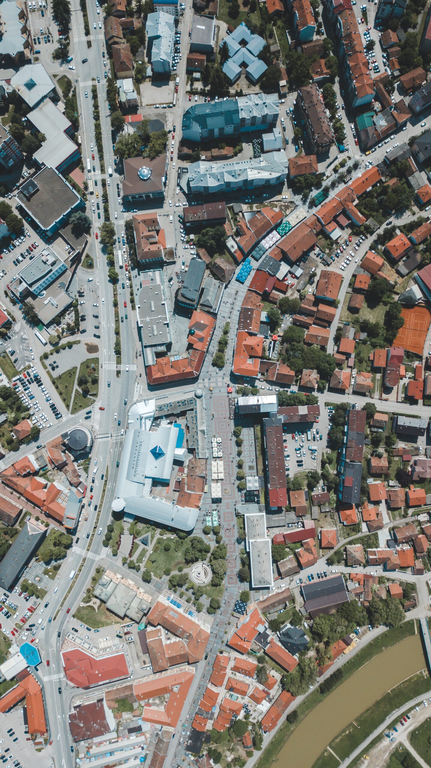 An aerial drone shot of the beautiful city architecture at daytime during Winter